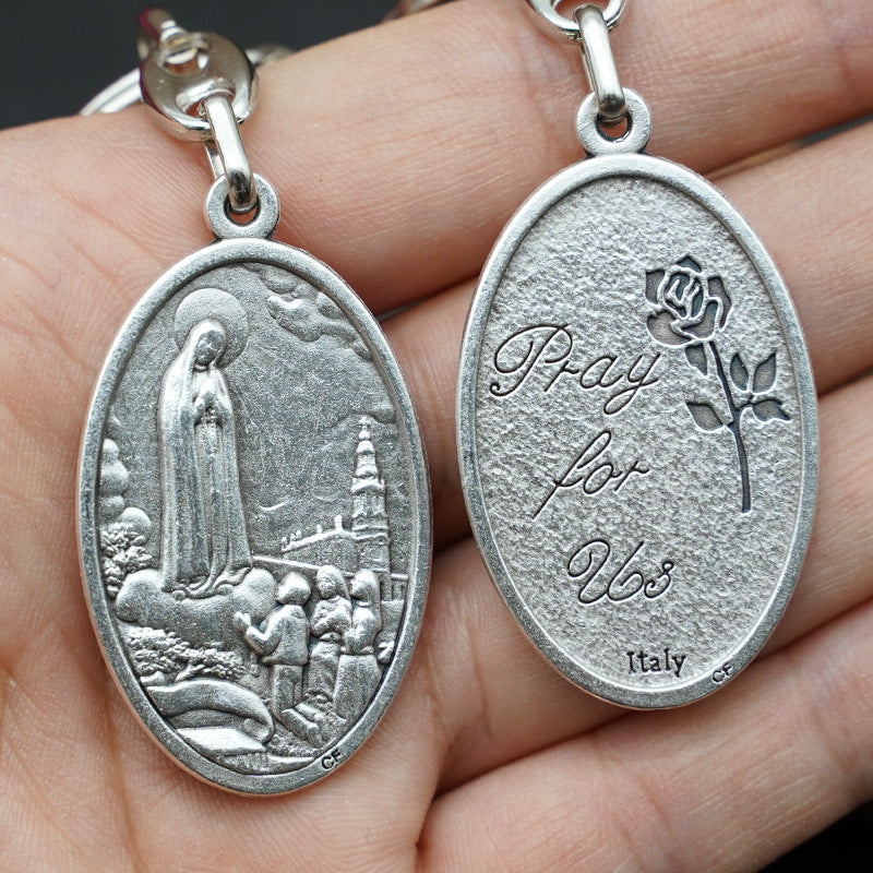 Our Lady of Fátima Keychain—Zinc alloy. Vintage grey Amen Artisan